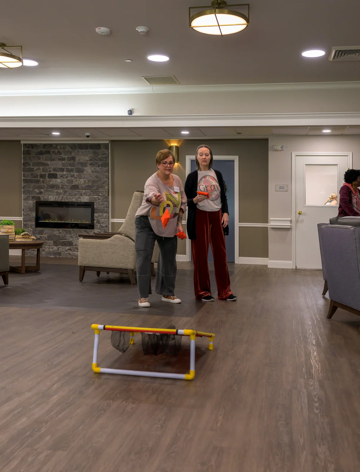 Staff and Resident Playing